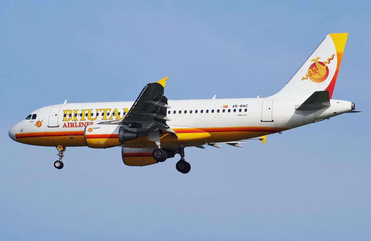 An aircraft in flight against a clear sky