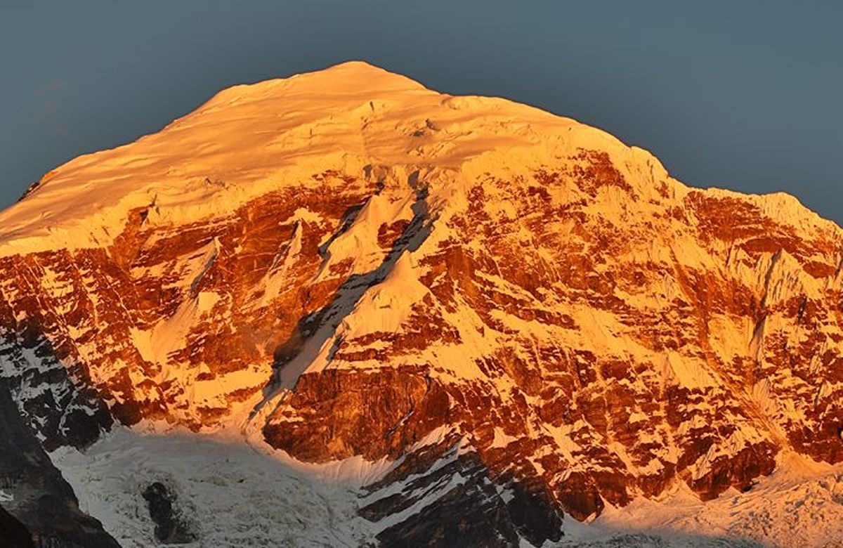 Alpenglow on a Himalayan summit at sunrise