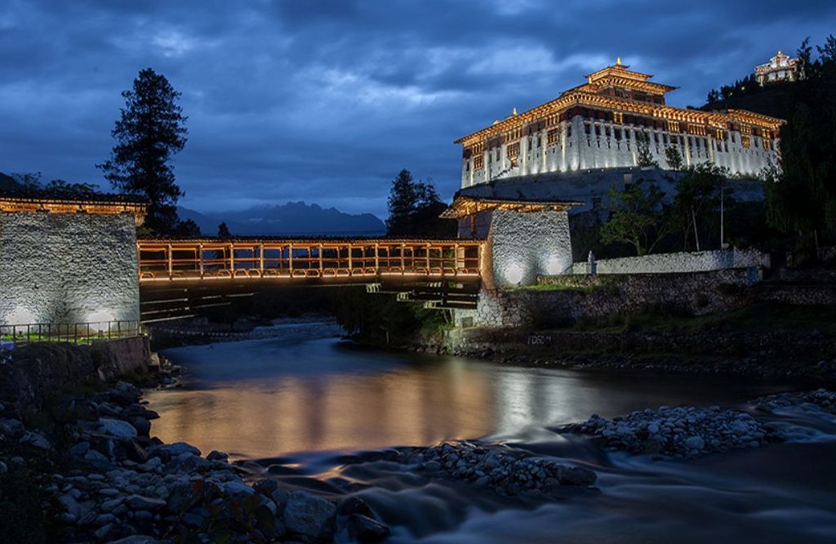 A cantilever bridge at dusk in Punakha